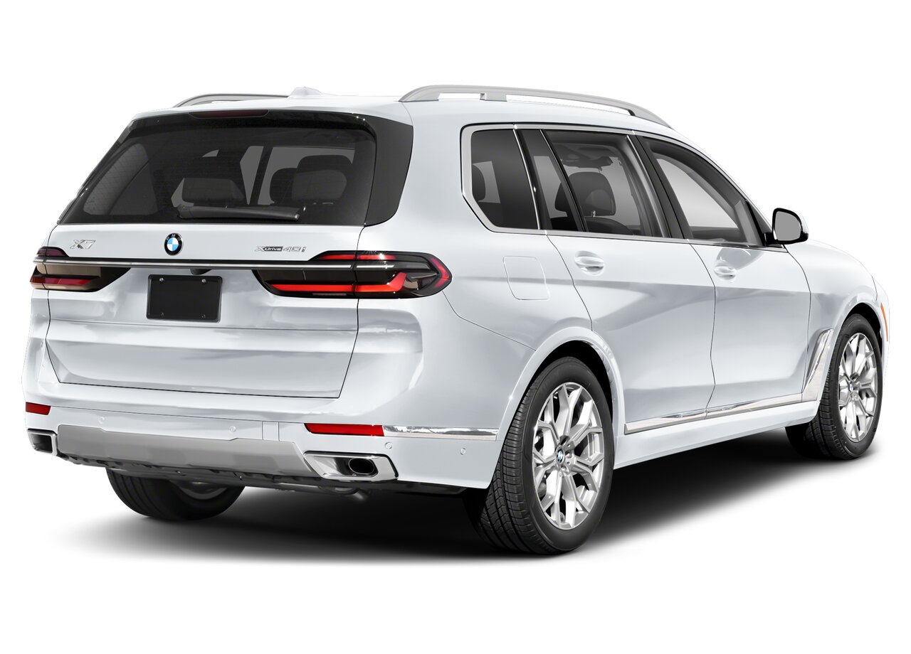 Rear view of the 2025 BMW X7, showcasing its LED taillights, sculpted tailgate, and dual exhaust design.