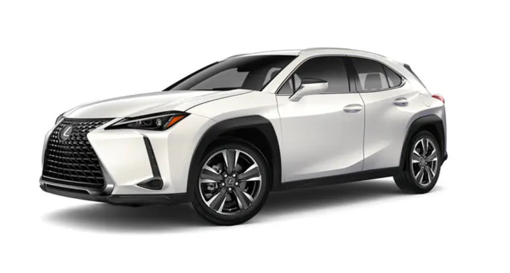 Front view of the 2025 Lexus UX 300h in white, featuring Lexus’ signature spindle grille, angular LED headlights, and an aerodynamic front bumper design.