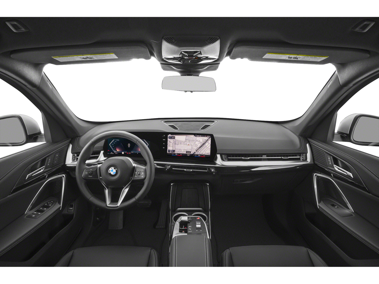 Interior of the 2025 BMW X1, featuring its premium leather seats, digital cockpit, and panoramic sunroof.