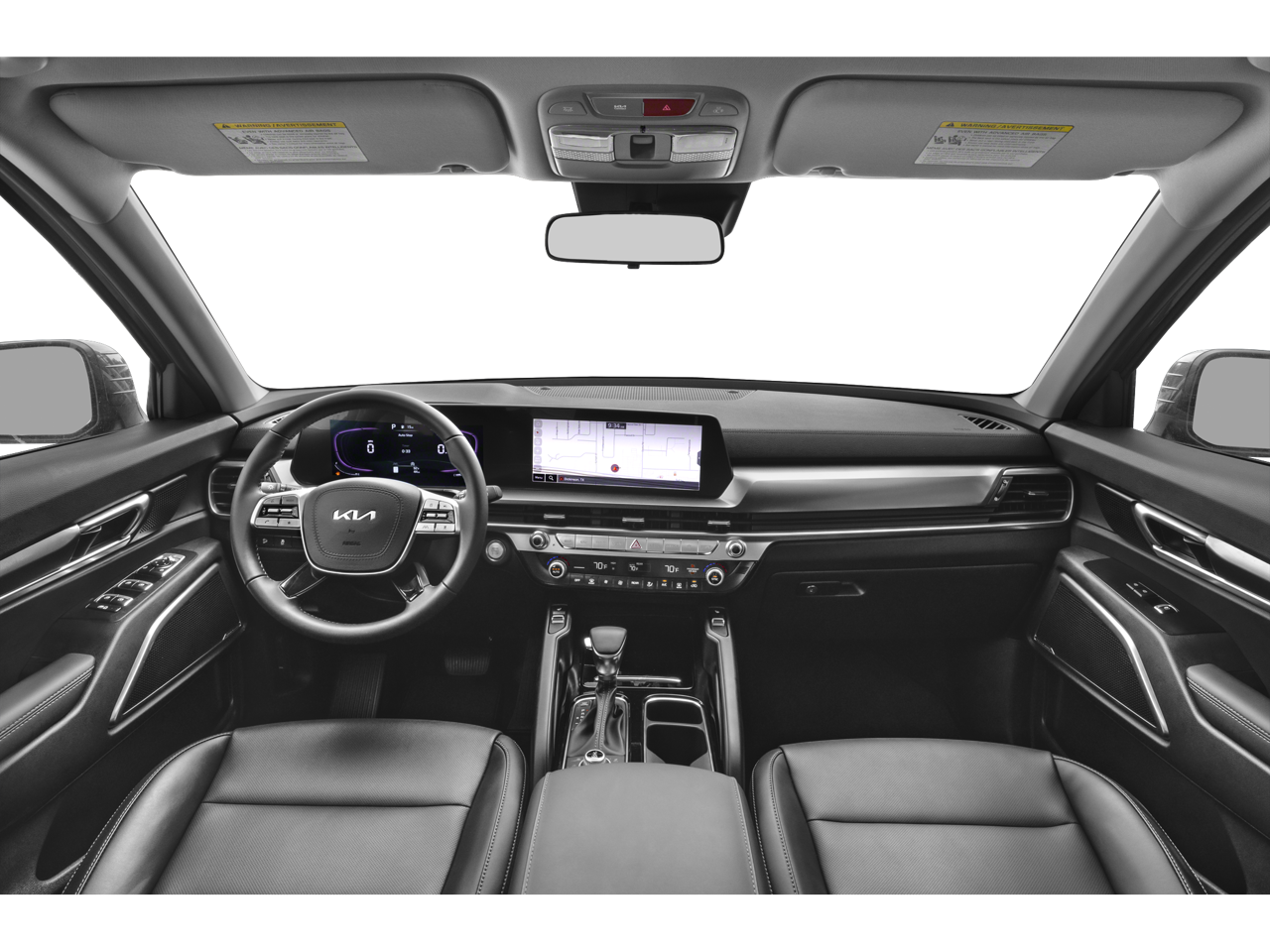 Interior view of the 2025 KIA Telluride, showcasing its leather seats, touchscreen infotainment system, and panoramic sunroof.