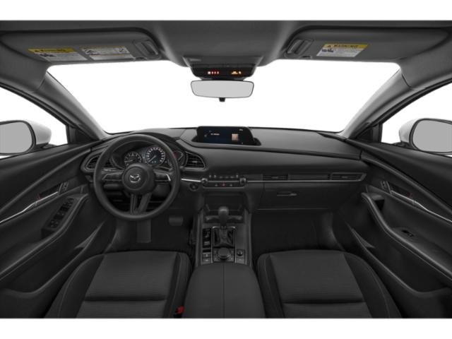 Interior of the 2025 Mazda CX-30, featuring its premium leather seats, digital dashboard, and infotainment touchscreen.