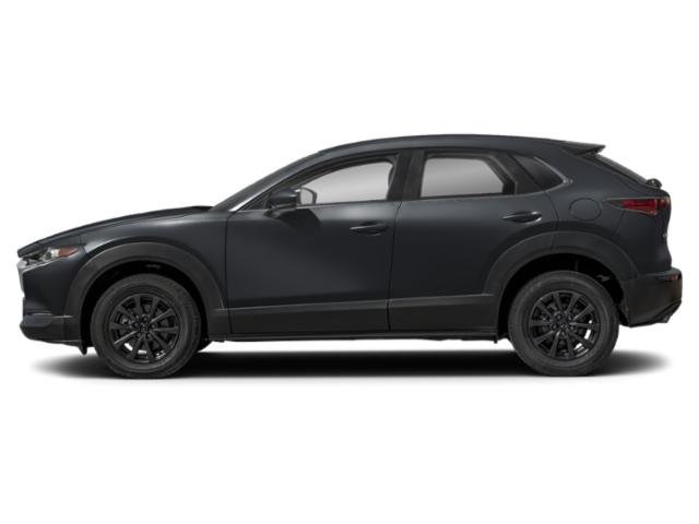 Side view of the Mazda CX-30, highlighting its sleek body lines, alloy wheels, and stylish crossover stance.