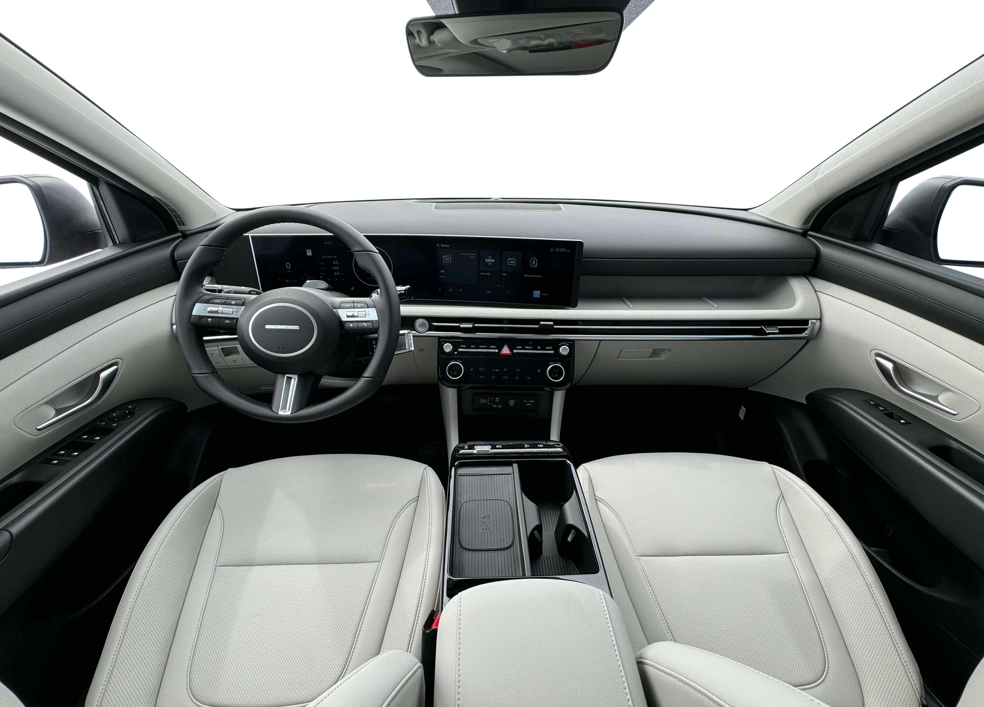 Dashboard of the 2025 Hyundai Tucson Hybrid Lease with 12.3-inch touchscreen.