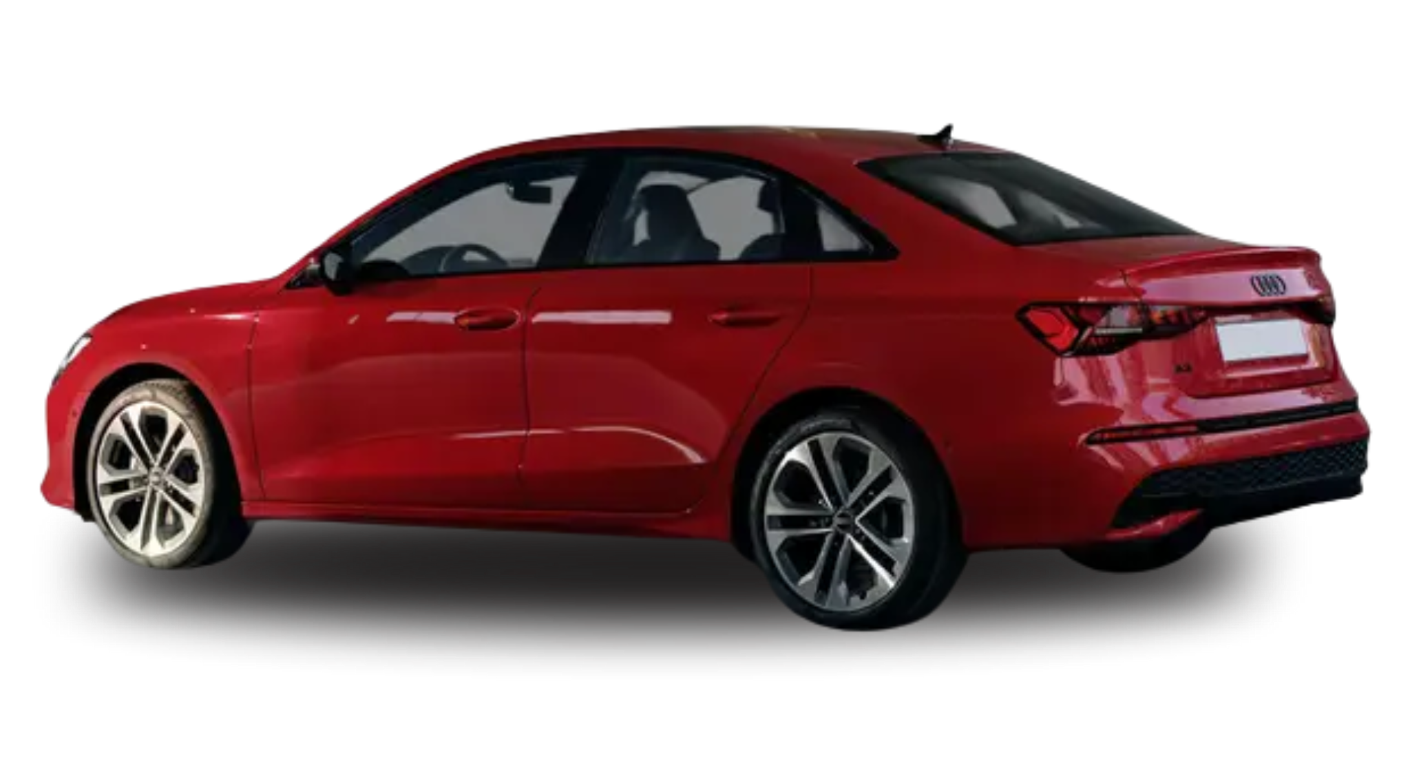 Rear view of the 2025 Audi A3 in red, showcasing its sleek design, LED taillights, and aerodynamic styling. A premium compact sedan with quattro AWD.