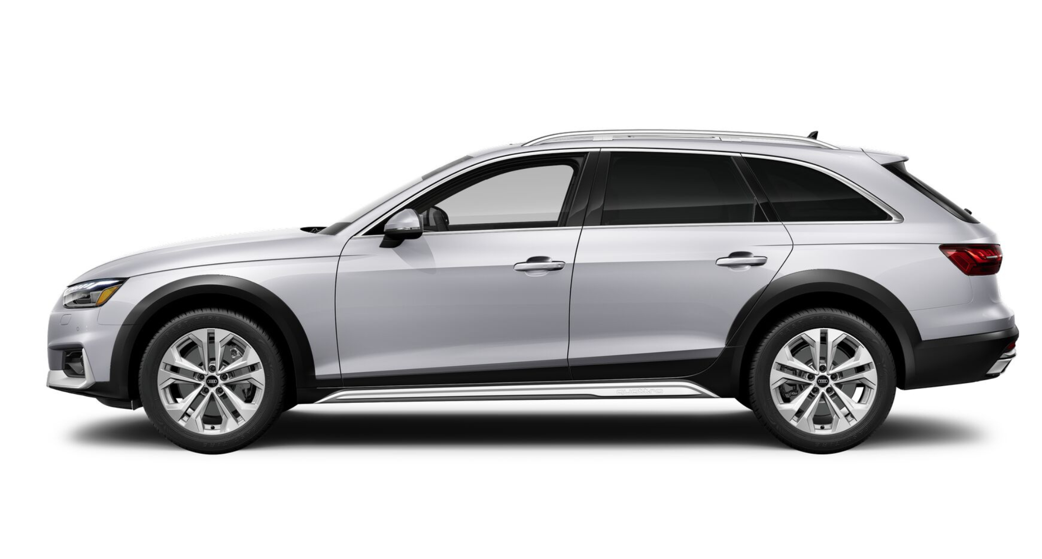 Side profile of the 2025 Audi A4 allroad, displaying its raised stance, rugged black cladding, silver roof rails, and sleek aerodynamic design.