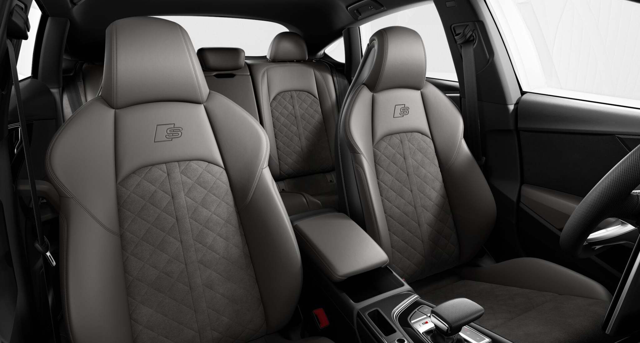 Luxurious interior of the 2025 Audi S5 Sportback featuring premium Nappa leather sport seats with diamond stitching, ergonomic design, and spacious rear seating for comfort and elegance.