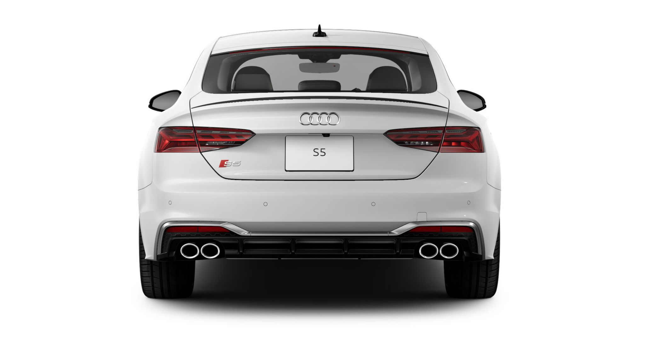 Sleek rear design of the 2025 Audi S5 Sportback with LED taillights, quad exhaust tips, an integrated rear spoiler, and the iconic Audi badge for a sporty yet sophisticated appearance.