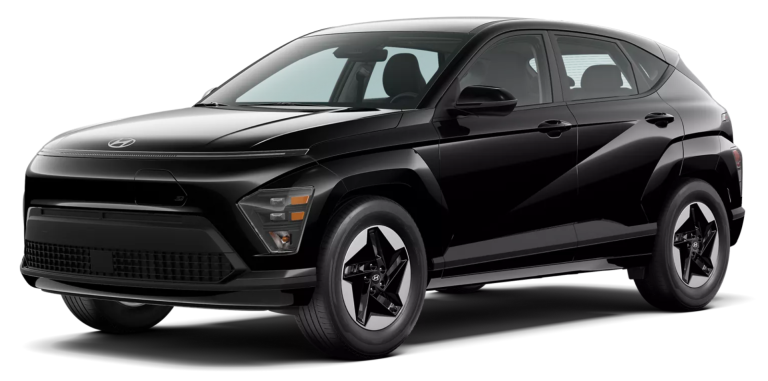 2025 Hyundai Kona Electric SE front exterior view with closed grille design, LED headlights, and sculpted front bumper in black.