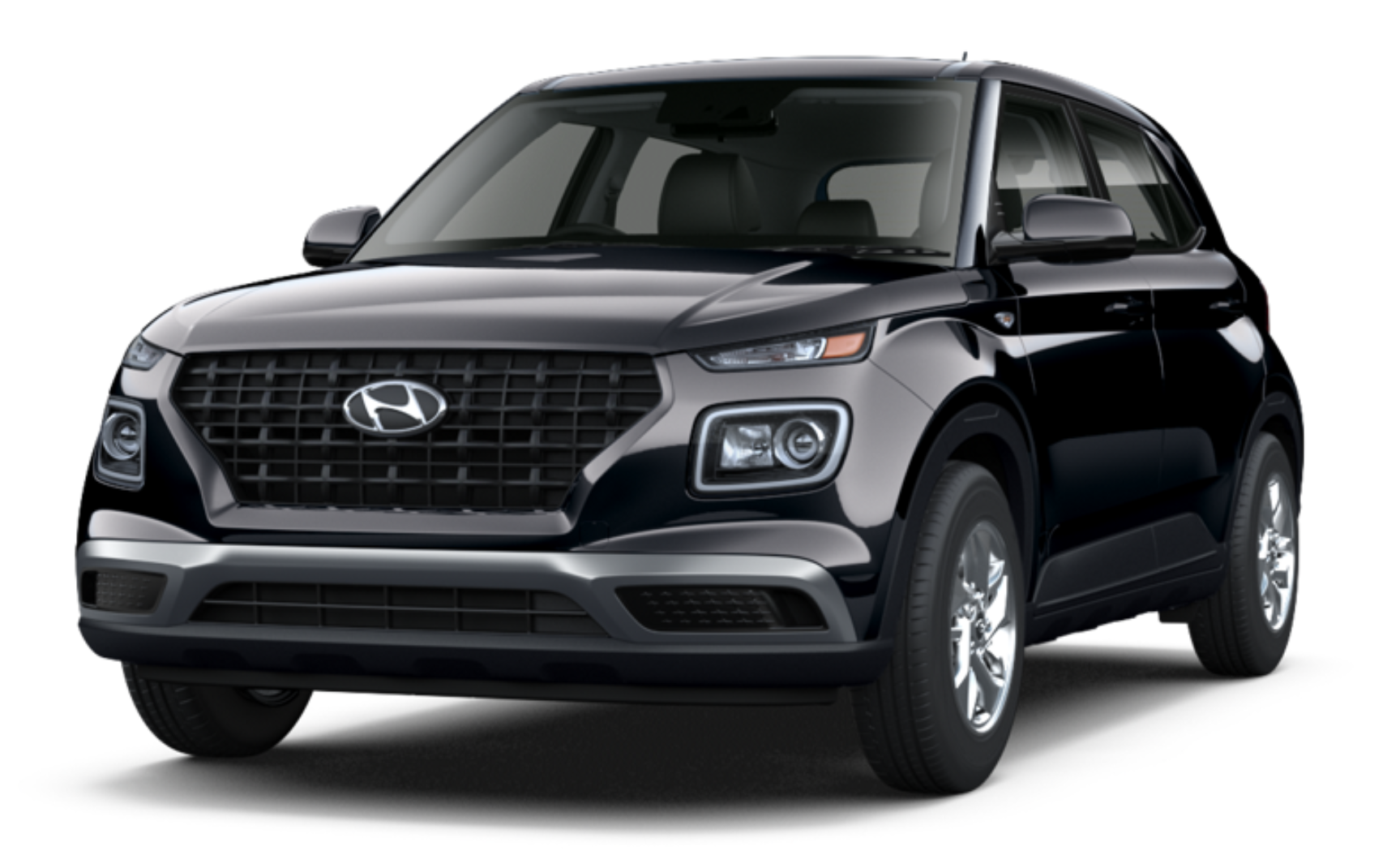 Front view of the 2025 Hyundai Venue SE featuring the signature black grille, projector halogen headlights, and a compact SUV stance designed for city driving.