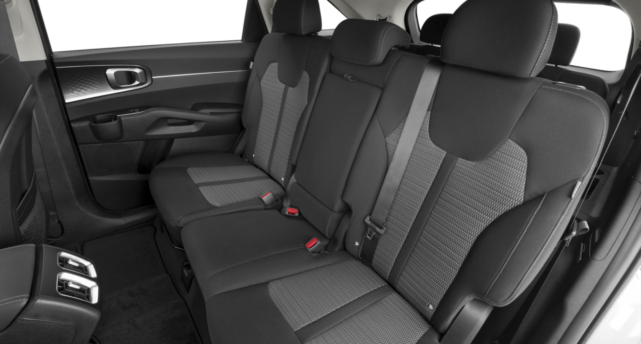 2025 Kia Sorento LX FWD rear passenger seats with black cloth upholstery, showing spacious second-row seating and easy third-row access.