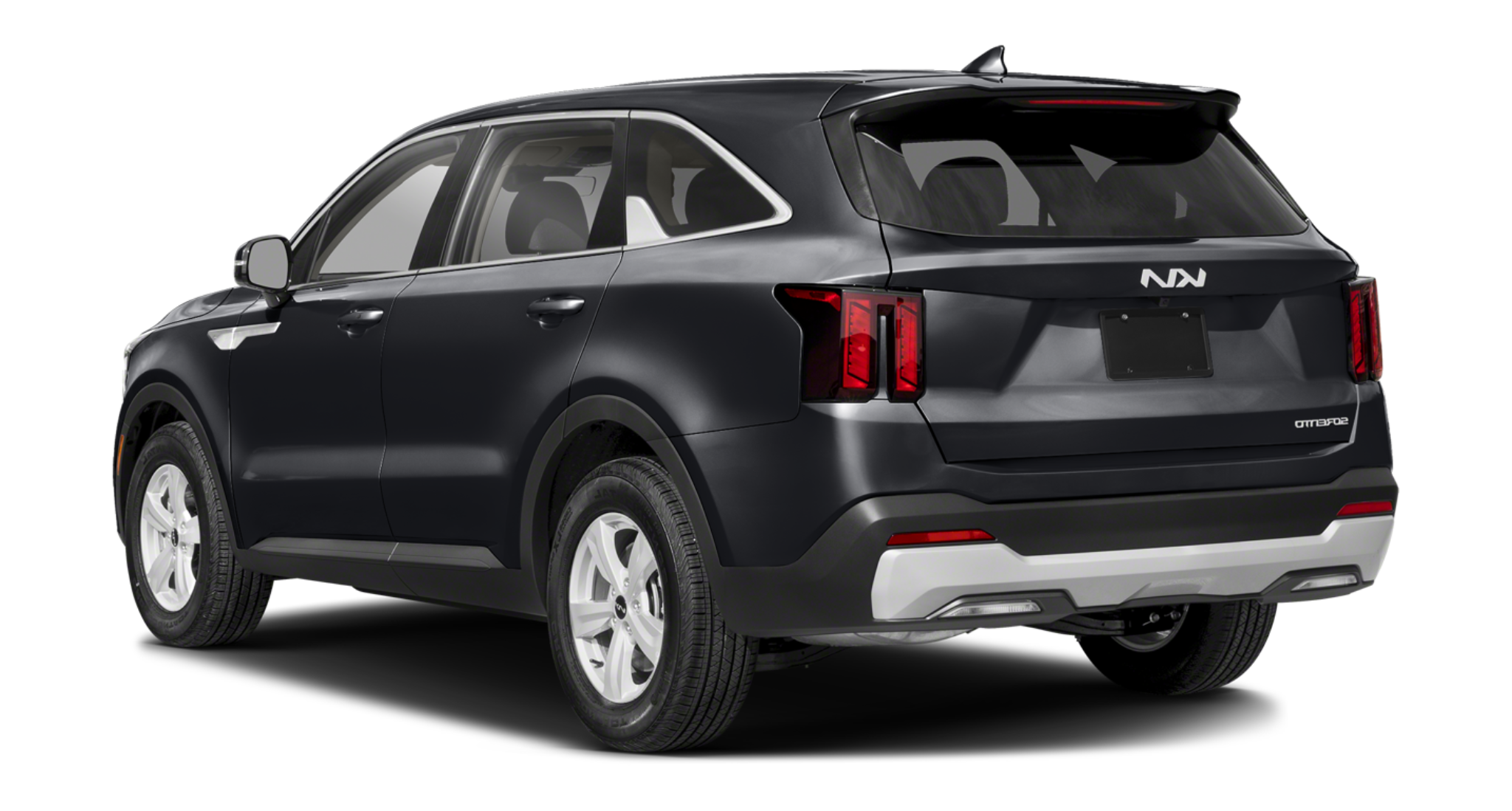 2025 Kia Sorento LX FWD rear view highlighting LED tail lights, rear spoiler, and the vehicle’s bold design with Kia badge and Sorento branding.