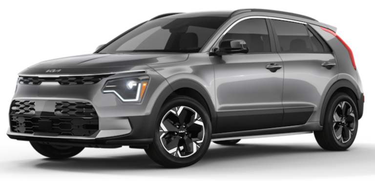 2025 Kia Niro EV Wind FWD front exterior view highlighting its bold front grille, LED headlights with signature lighting, and 17-inch aero alloy wheels.
