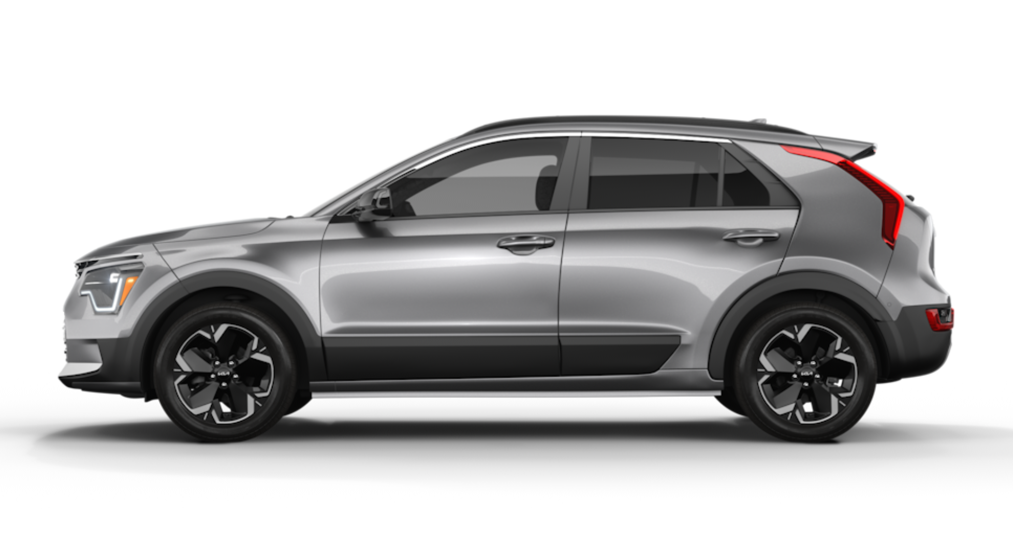 2025 Kia Niro EV Wind FWD side profile displaying its sleek crossover design, roof rails, gloss black accents, and stylish alloy wheels for a dynamic look.