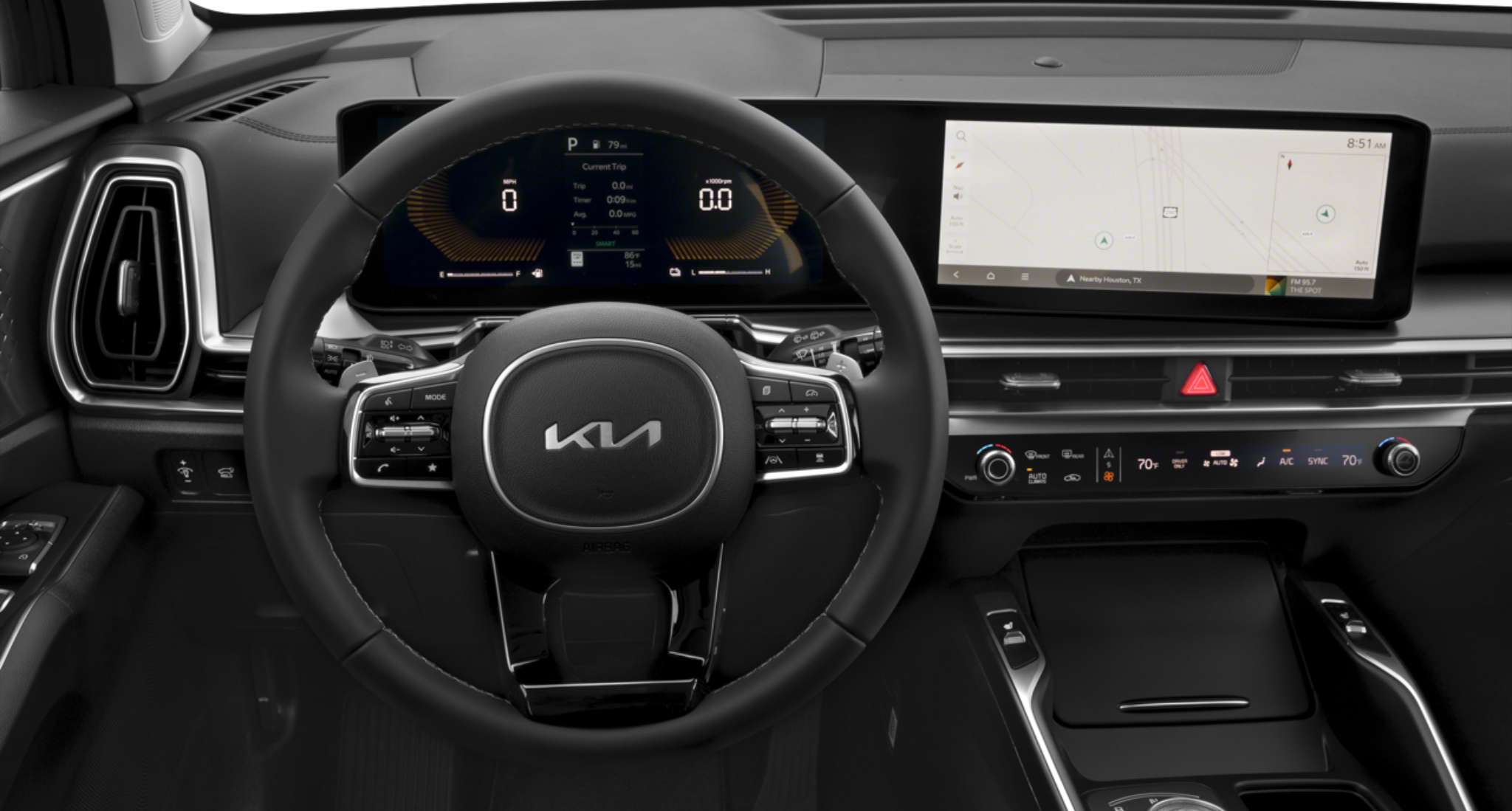 2025 Kia Sorento Hybrid EX interior showing the panoramic digital dashboard with a 12.3-inch display, leather-wrapped steering wheel, and dual-zone climate controls.