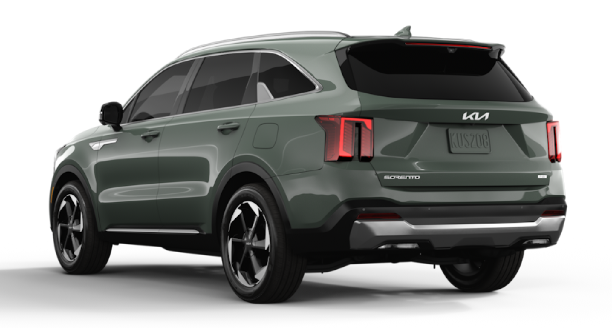 Rear view of the 2025 Kia Sorento PHEV EX AWD in Runway Red, highlighting its bold taillight design, rear spoiler, Sorento and PHEV badging, and sculpted rear bumper with all-wheel drive capability.