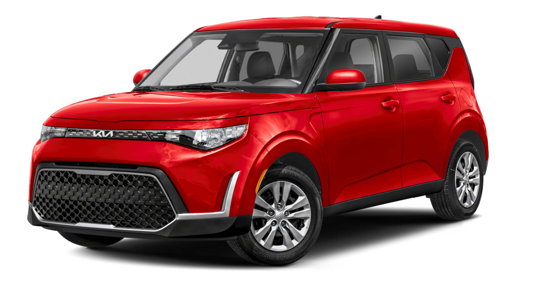 Front view of the 2025 Kia Soul LX FWD in red, displaying its bold grille, sharp LED headlights, and contemporary styling with a sporty urban look.