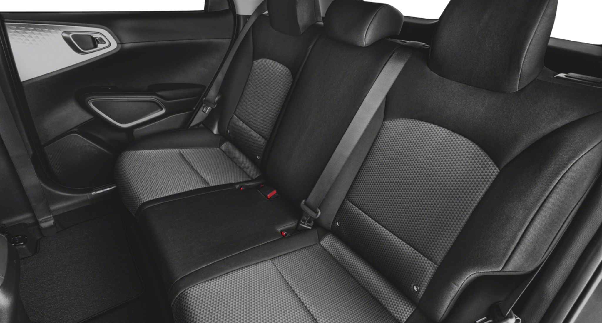 Rear interior view of the 2025 Kia Soul LX FWD showcasing the spacious back seats with two-tone woven cloth upholstery and ample legroom, designed for passenger comfort.