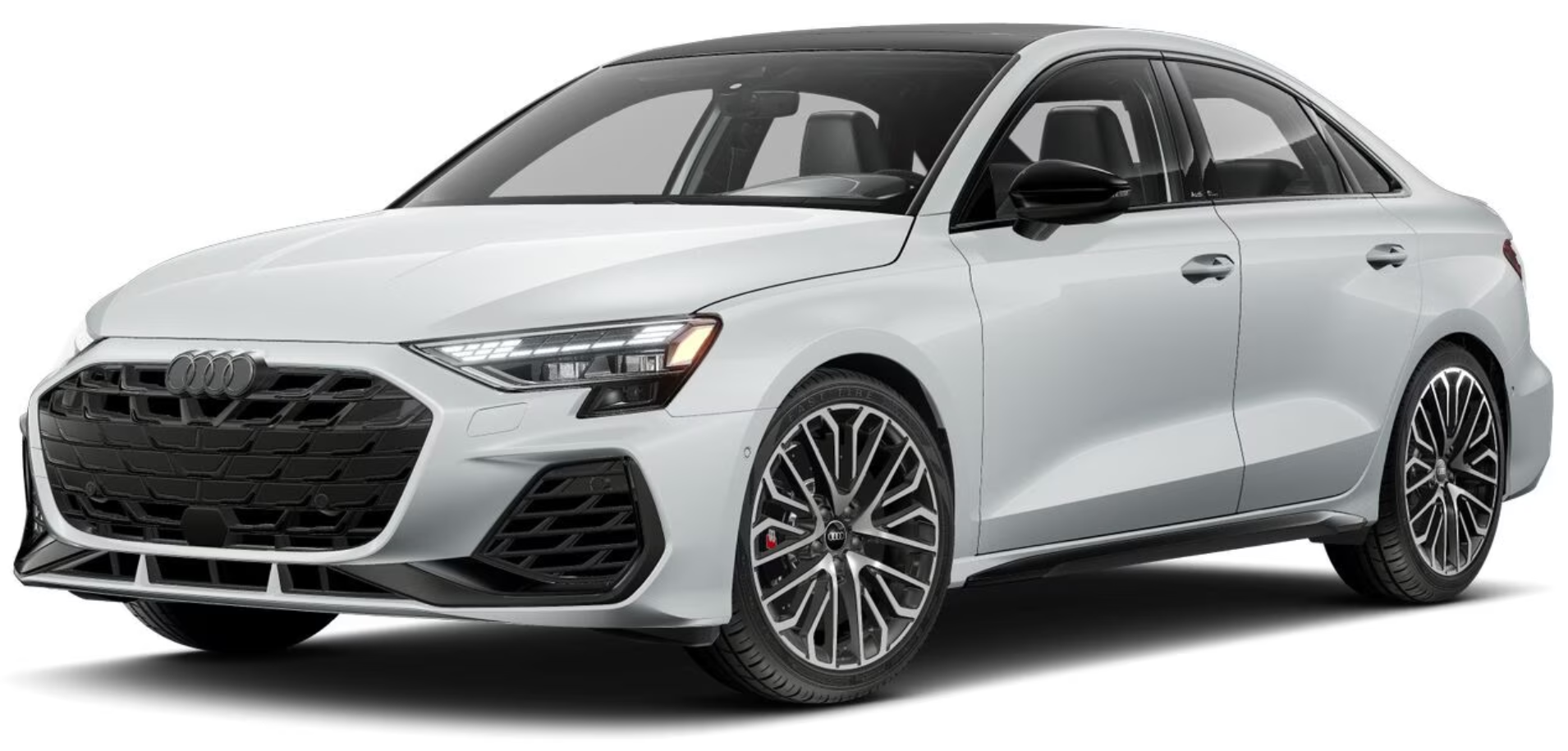 The 2025 Audi S3 in a striking front view, showcasing its aggressive black grille, sharp LED headlights, and aerodynamic design for a sporty, modern appeal.