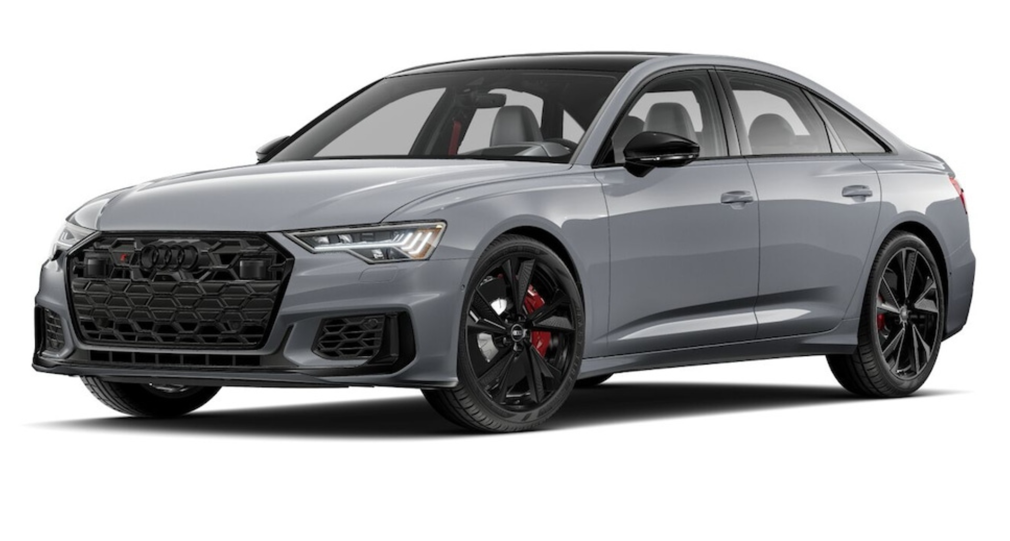 Bold front view of the 2025 Audi S6, highlighting its black honeycomb grille, sharp LED headlights, and aggressive front bumper that exudes power and sophistication.