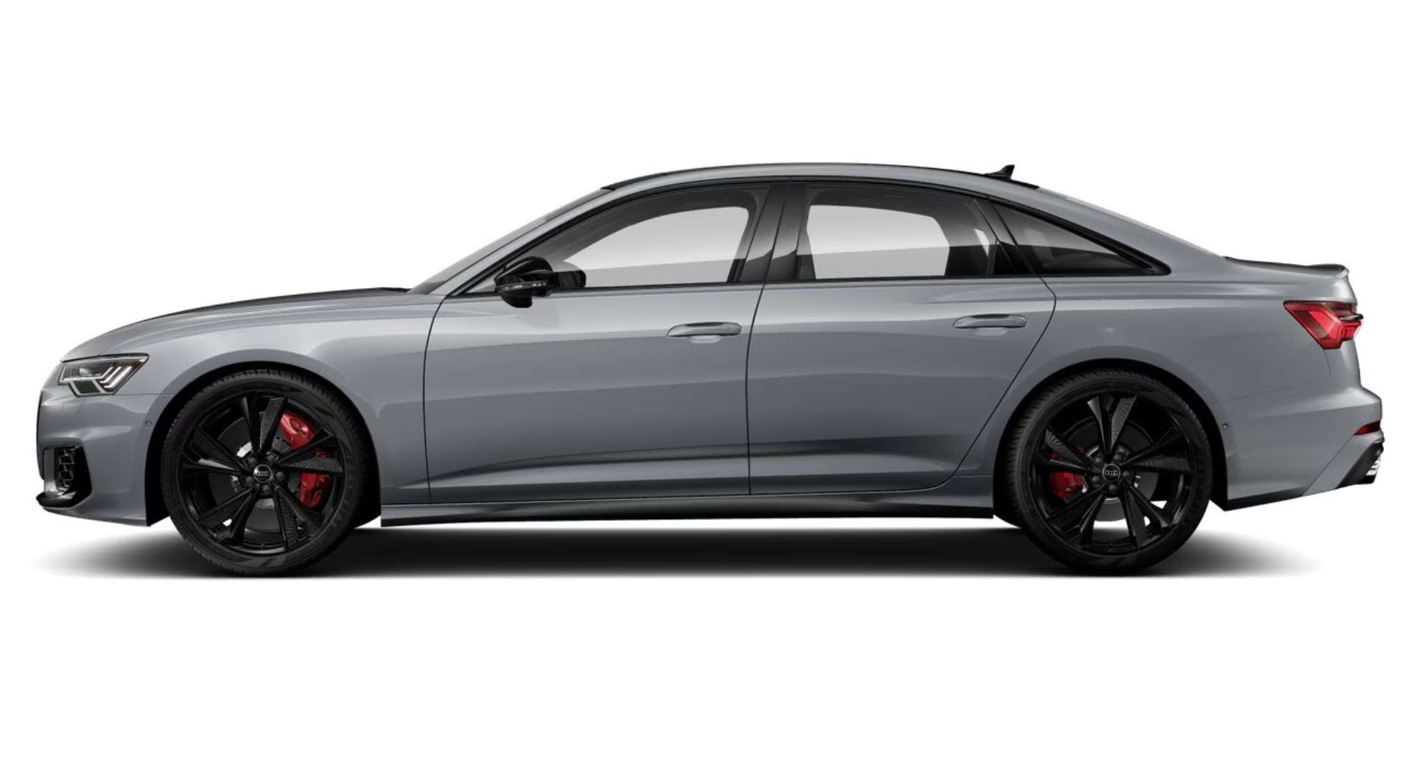 A striking side profile of the 2025 Audi S6 in metallic gray, featuring blacked-out wheels, red brake calipers, and an aggressive stance for a dynamic and performance-driven design.