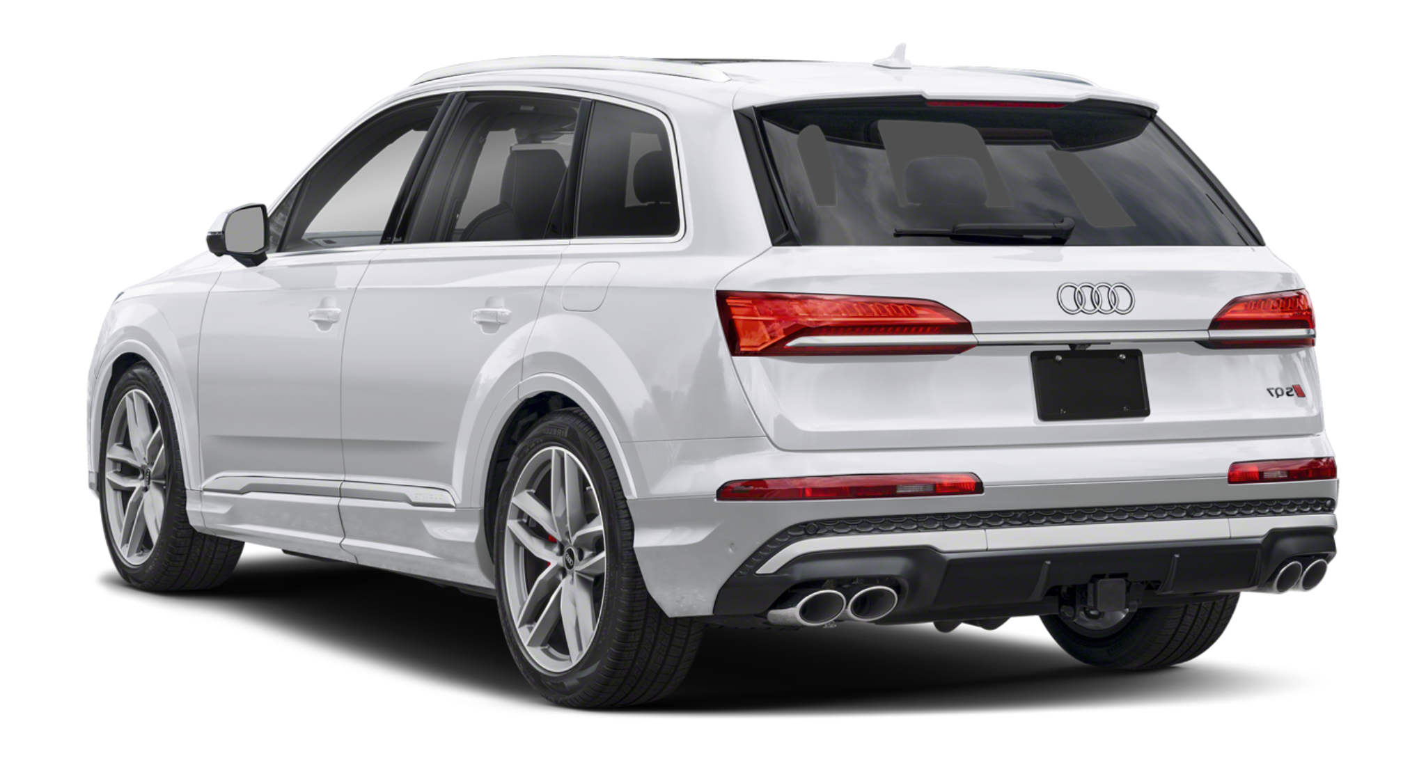 Rear exterior view of the 2025 Audi SQ7, emphasizing its quad exhaust outlets, sculpted LED taillights, rear spoiler, and bold S badge, illustrating the SUV’s sporty design and performance features.