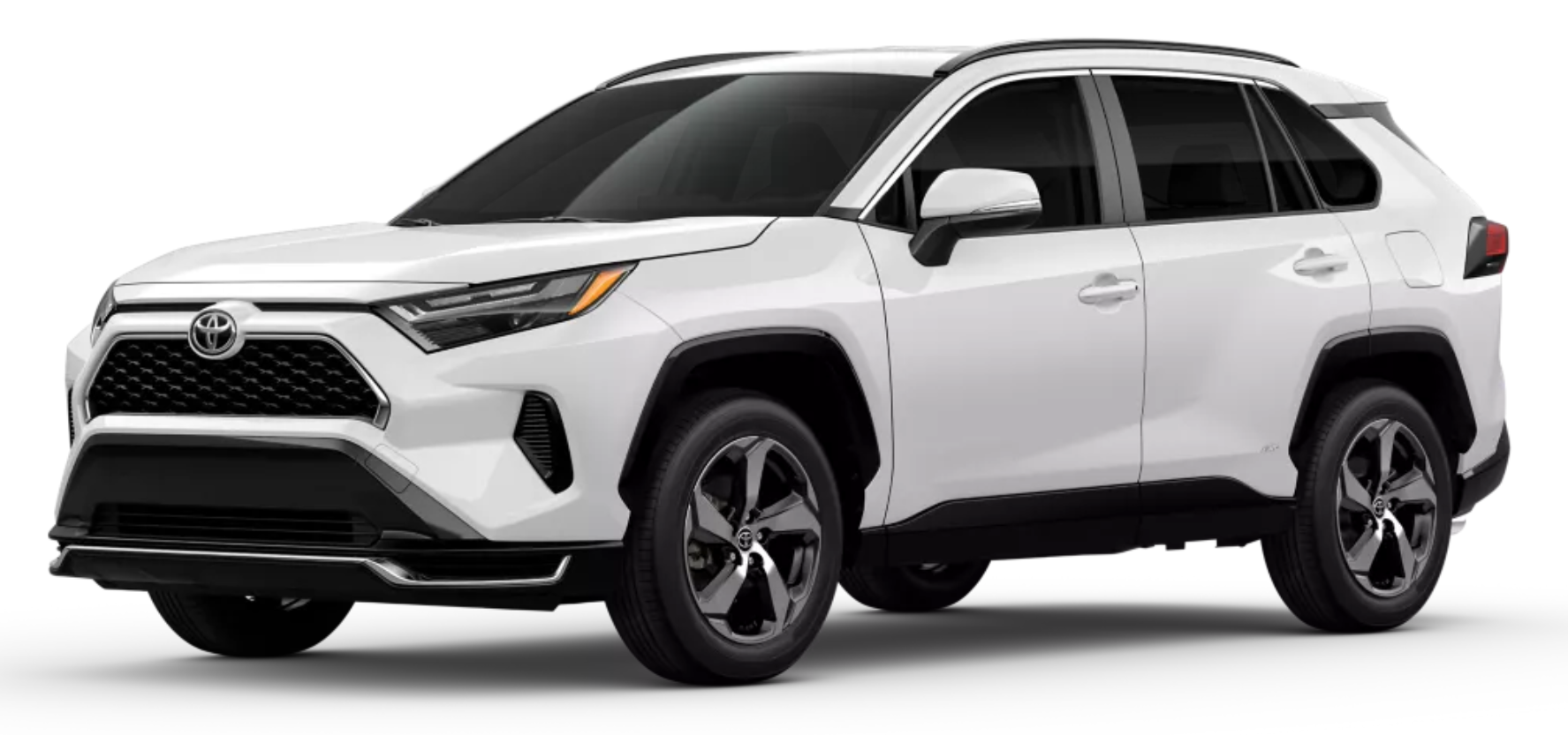 2025 Toyota RAV4 Plug-in Hybrid SE AWD in white shown from front-side angle with alloy wheels and roof rails