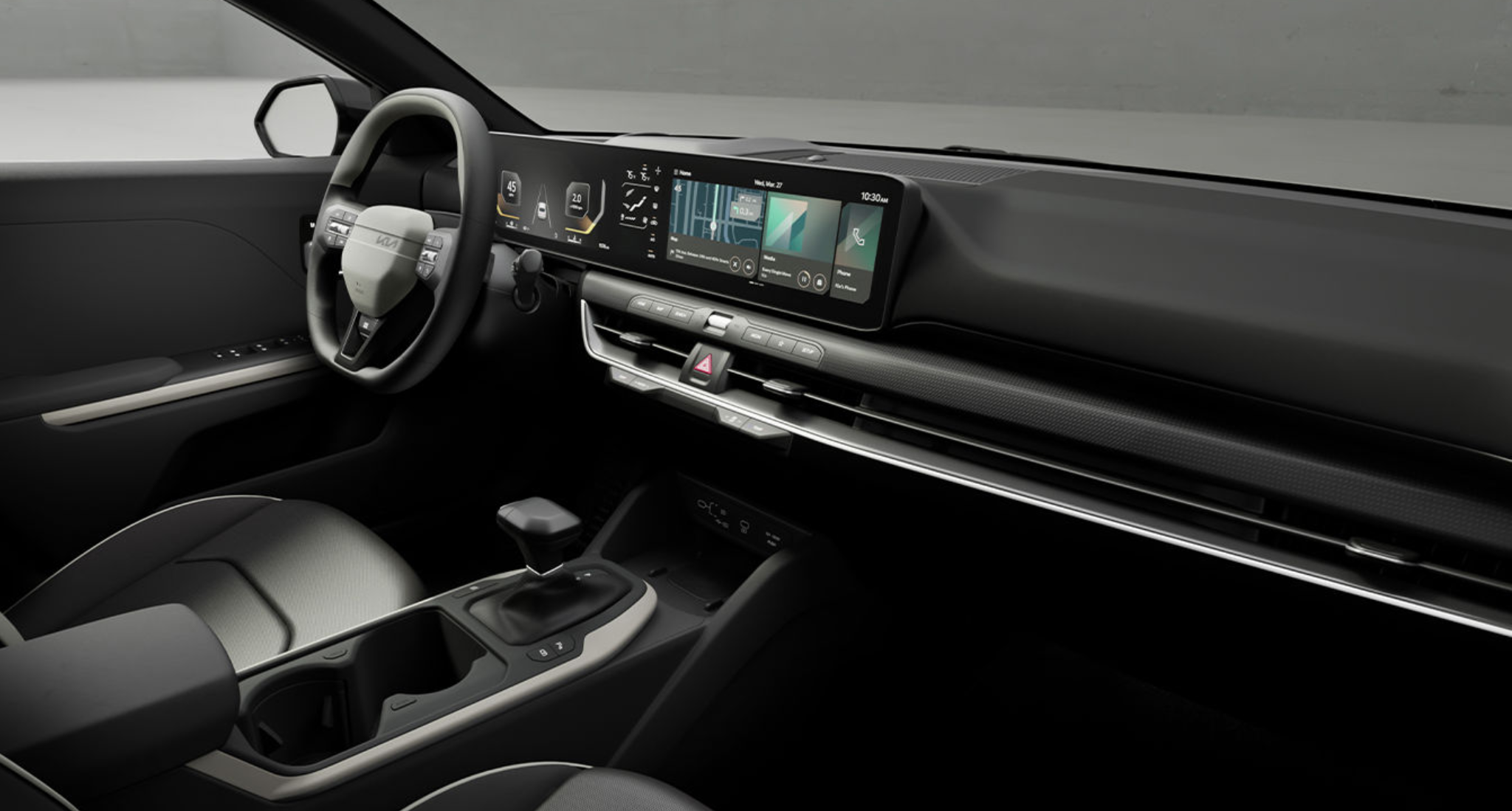 Modern interior of the 2025 Kia K4 LX showcasing the digital instrument cluster, a 12.3-inch touchscreen infotainment system with Kia Connect, and a sleek, minimalist dashboard design.