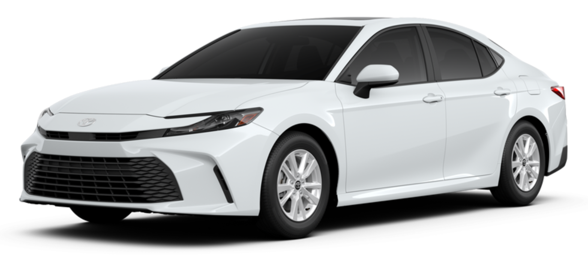Angled front view of the 2025 Toyota Camry LE FWD, emphasizing its sculpted hood, aggressive grille, and contemporary design features.