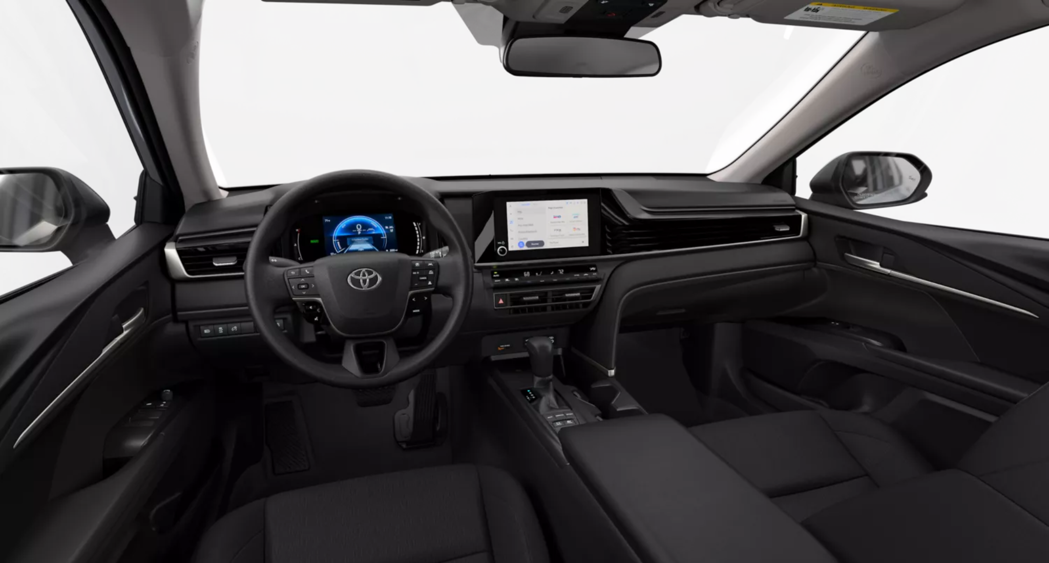 2025 Toyota Camry LE dashboard featuring a digital driver display, 7-inch touchscreen with Apple CarPlay and Android Auto, and dual-zone climate controls.