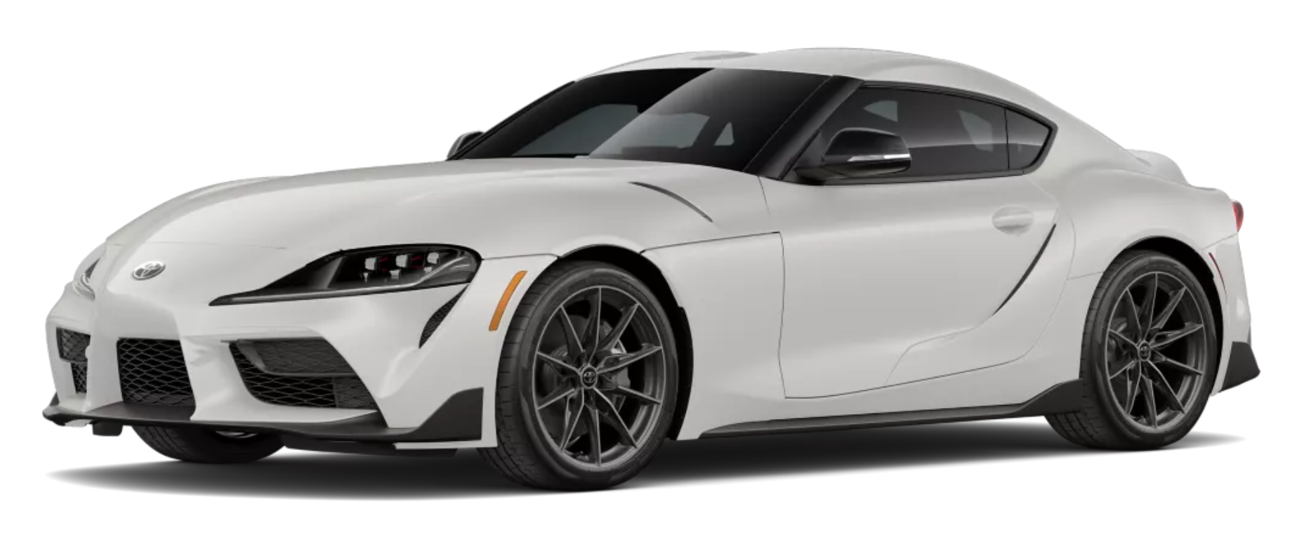 Angled front view of the 2025 Toyota GR Supra 3.0 RWD in white, highlighting its 19-inch alloy wheels, aerodynamic curves, and bold sports coupe styling.