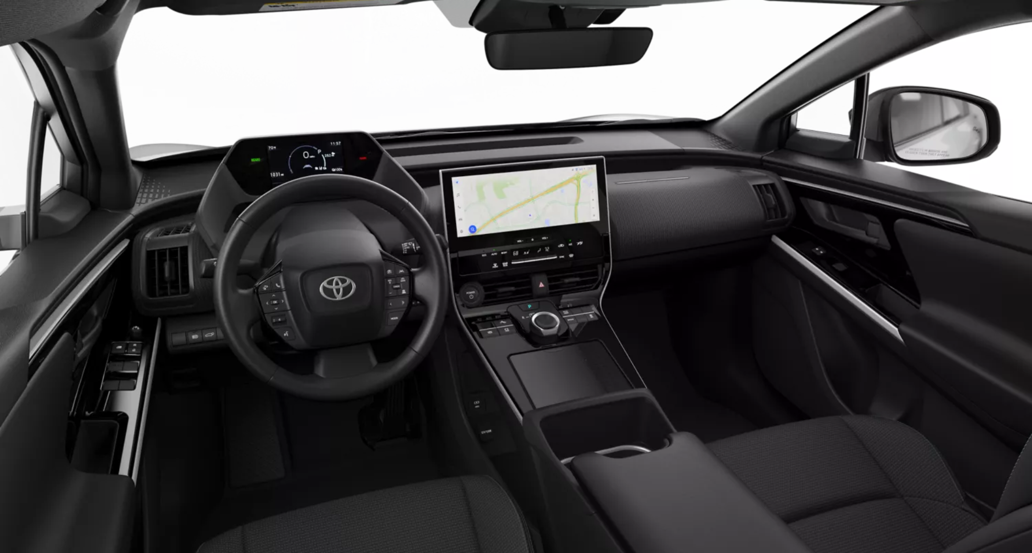 Driver-focused dashboard of the 2025 Toyota bZ4X XLE featuring a 12.3-inch touchscreen display and digital gauge cluster