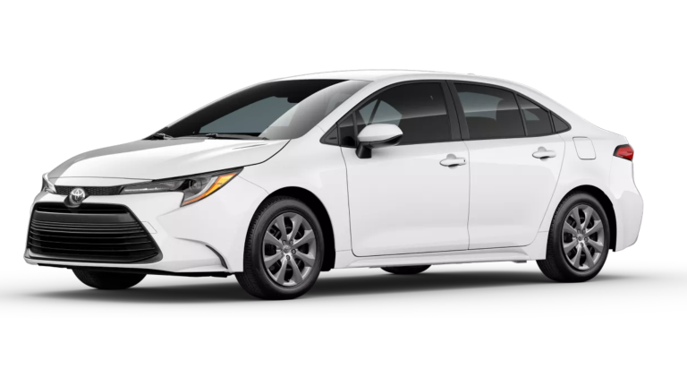 Front view of the 2025 Toyota Corolla LE FWD highlighting LED headlights, bold front grille, and sleek aerodynamic design.