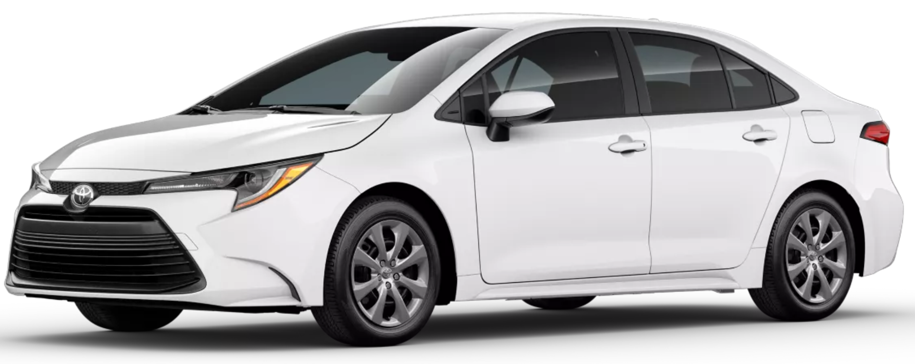 Front view of the 2025 Toyota Corolla LE FWD highlighting LED headlights, bold front grille, and sleek aerodynamic design.