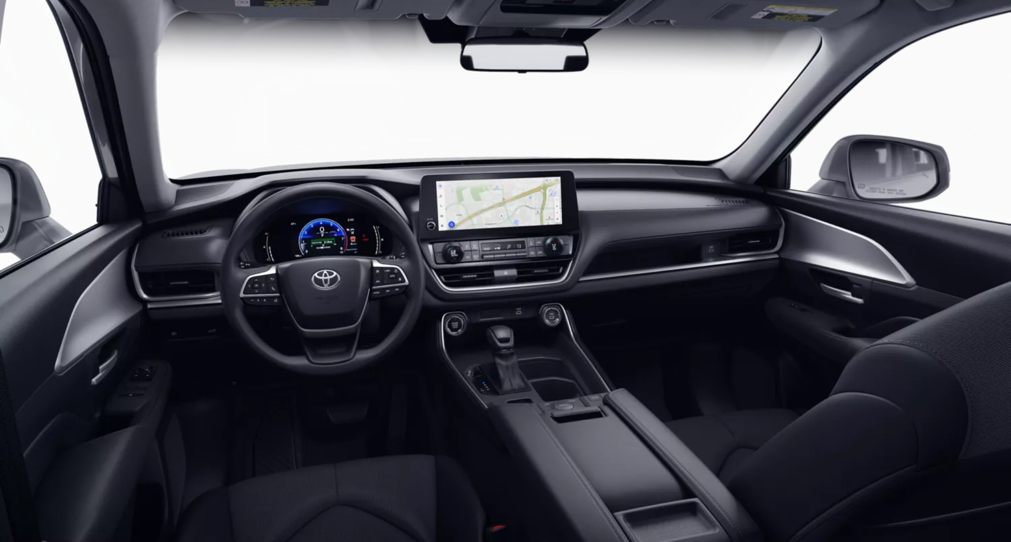2025 Toyota Grand Highlander LE dashboard featuring a 12.3-inch touchscreen display, digital driver cluster, and modern center console layout.