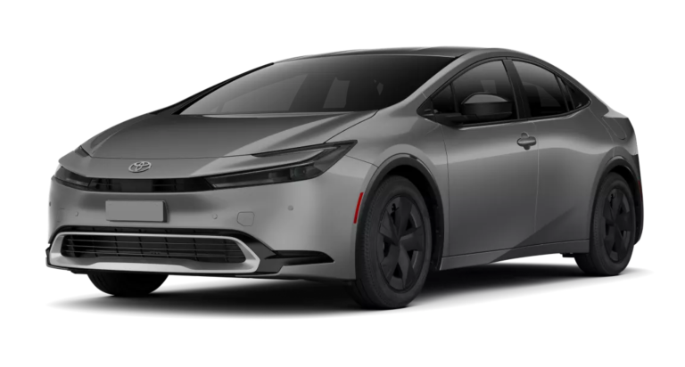 Front view of the 2025 Toyota Prius PHEV LE in silver, displaying its modern front grille, slim LED headlights, and aerodynamic bumper design.