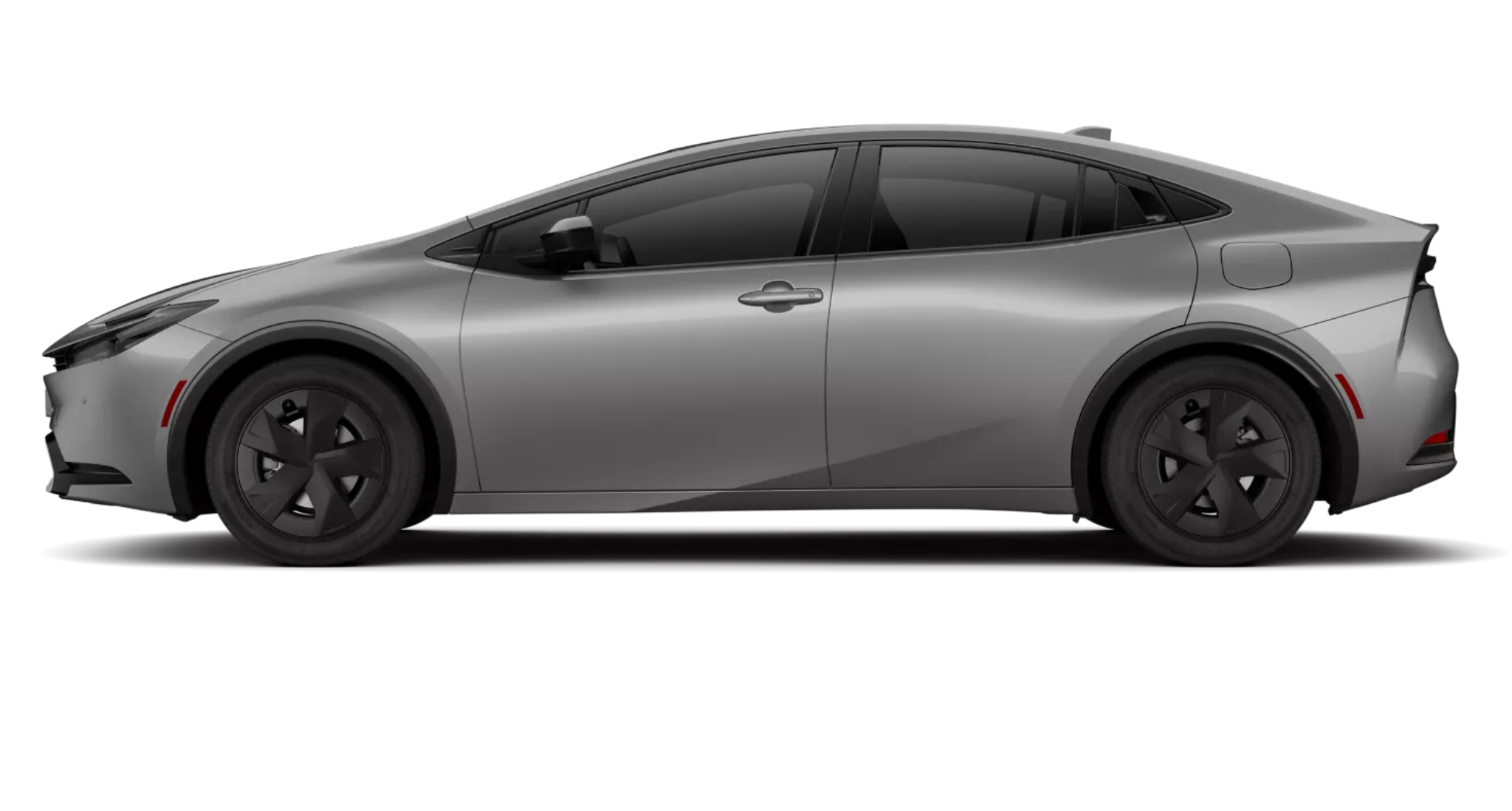 Exterior side profile of the 2025 Toyota Prius PHEV LE in silver, showcasing its aerodynamic design, black alloy wheels, and sleek body lines.