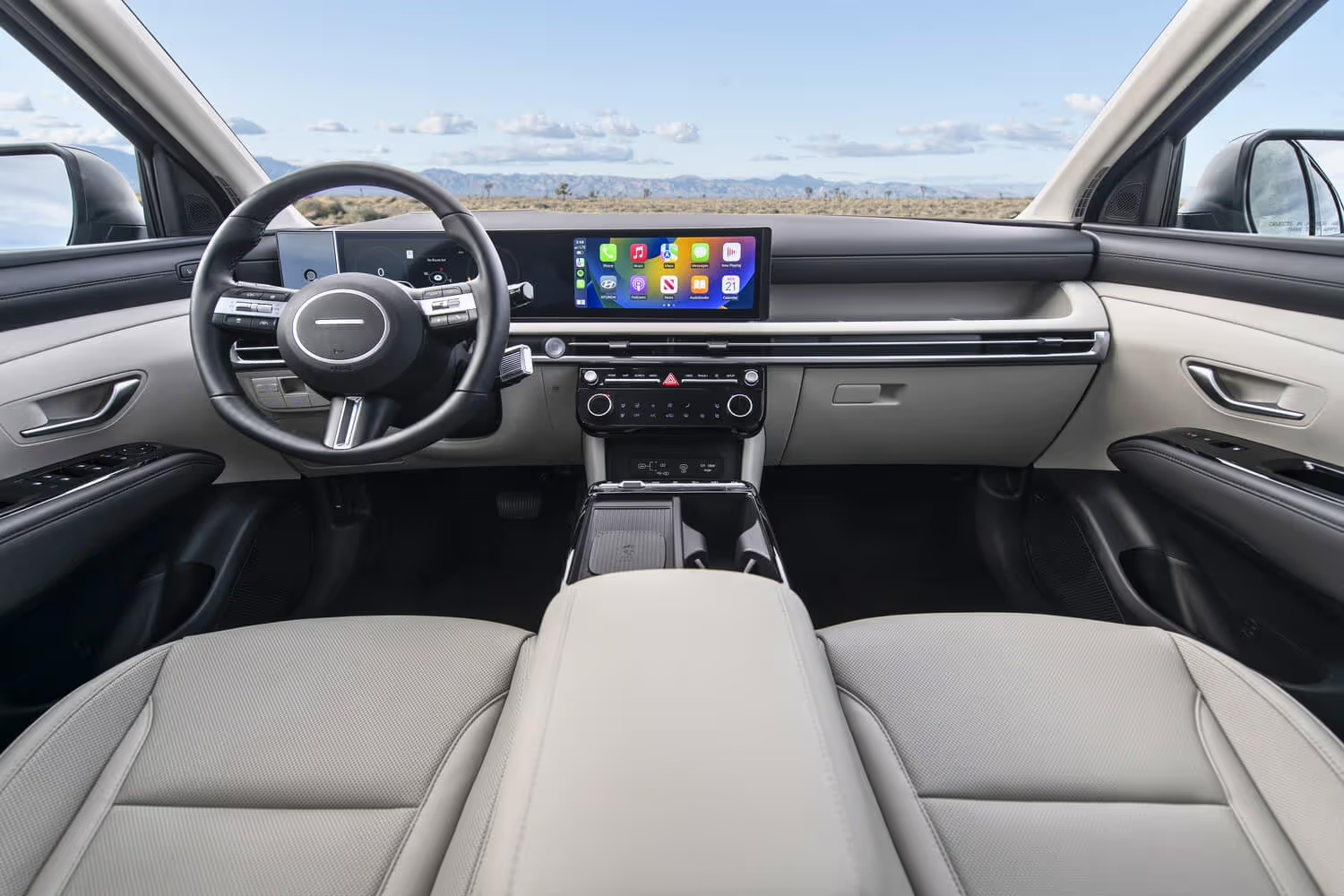 Interior dashboard of 2025 Hyundai Tucson lease with 12.3-inch touchscreen.