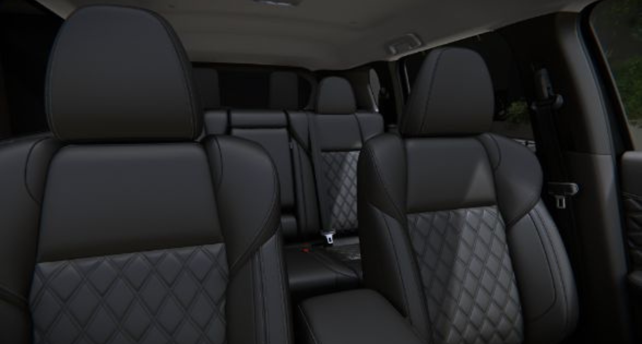 Premium cloth trimmed seats of the 2025 Mitsubishi Outlander PHEV ES AWD featuring three-row seating and spacious rear cabin.