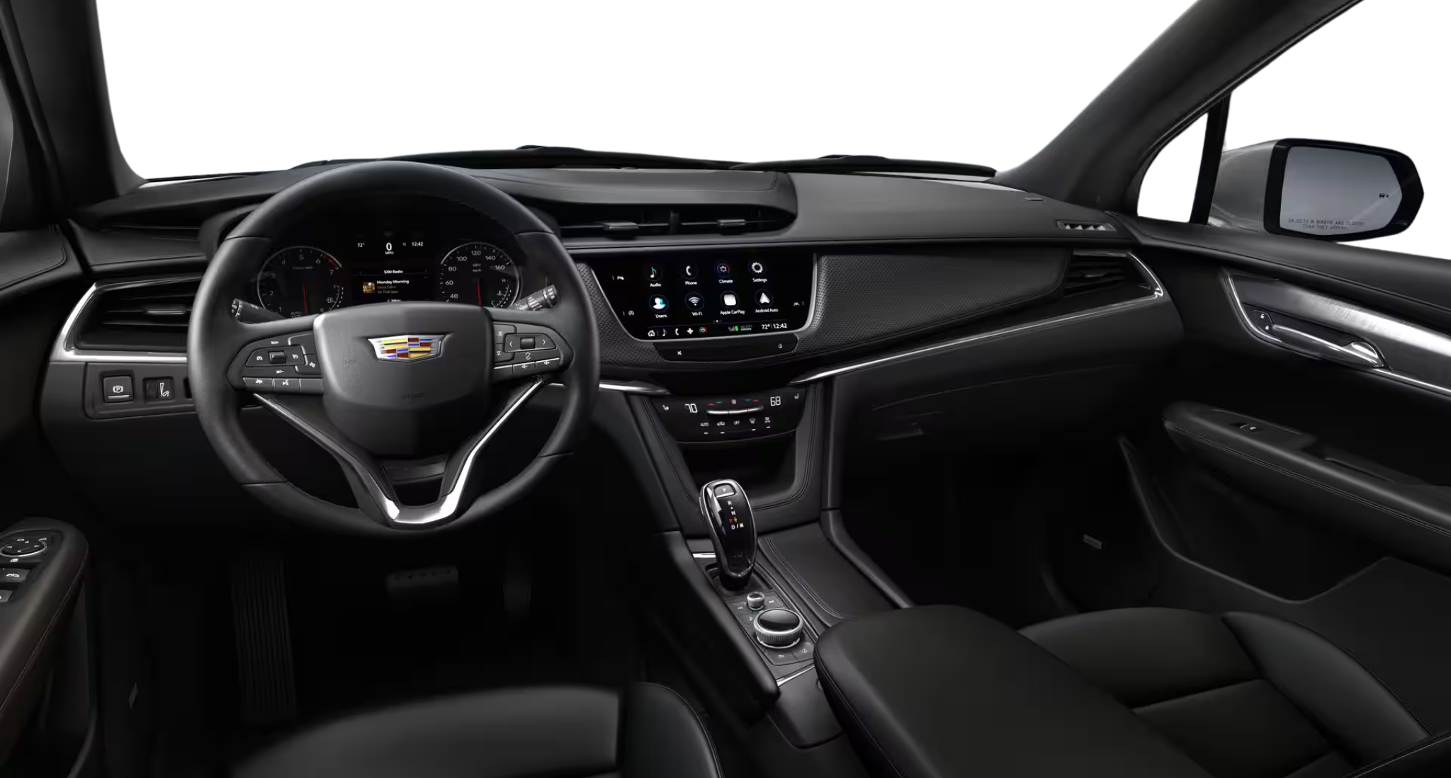 Premium driver-focused dashboard of the 2025 Cadillac XT6 Luxury AWD featuring an 8-inch touchscreen display, leather-wrapped steering wheel, and modern control layout.