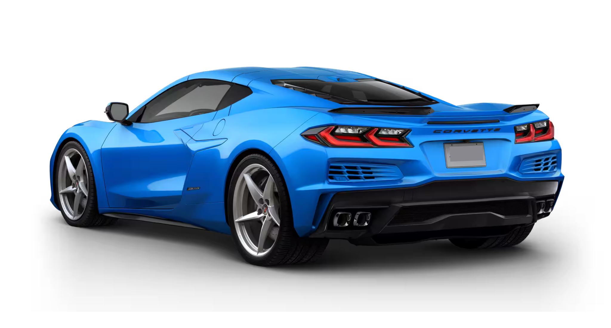 Rear view of the 2025 Chevrolet Corvette E-Ray AWD in metallic blue featuring quad exhaust, sculpted tail lights, and signature badging.