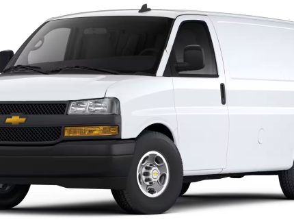 Front view of the 2025 Chevrolet Express Cargo WT RWD featuring the Chevrolet grille, dual headlamps, and rugged design.