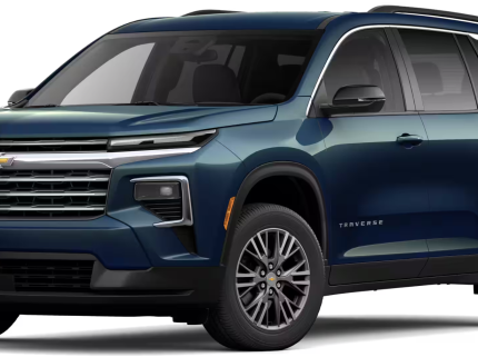 Front view of 2025 Chevrolet Traverse in navy blue featuring bold grille, slim LED headlights, and modern SUV styling
