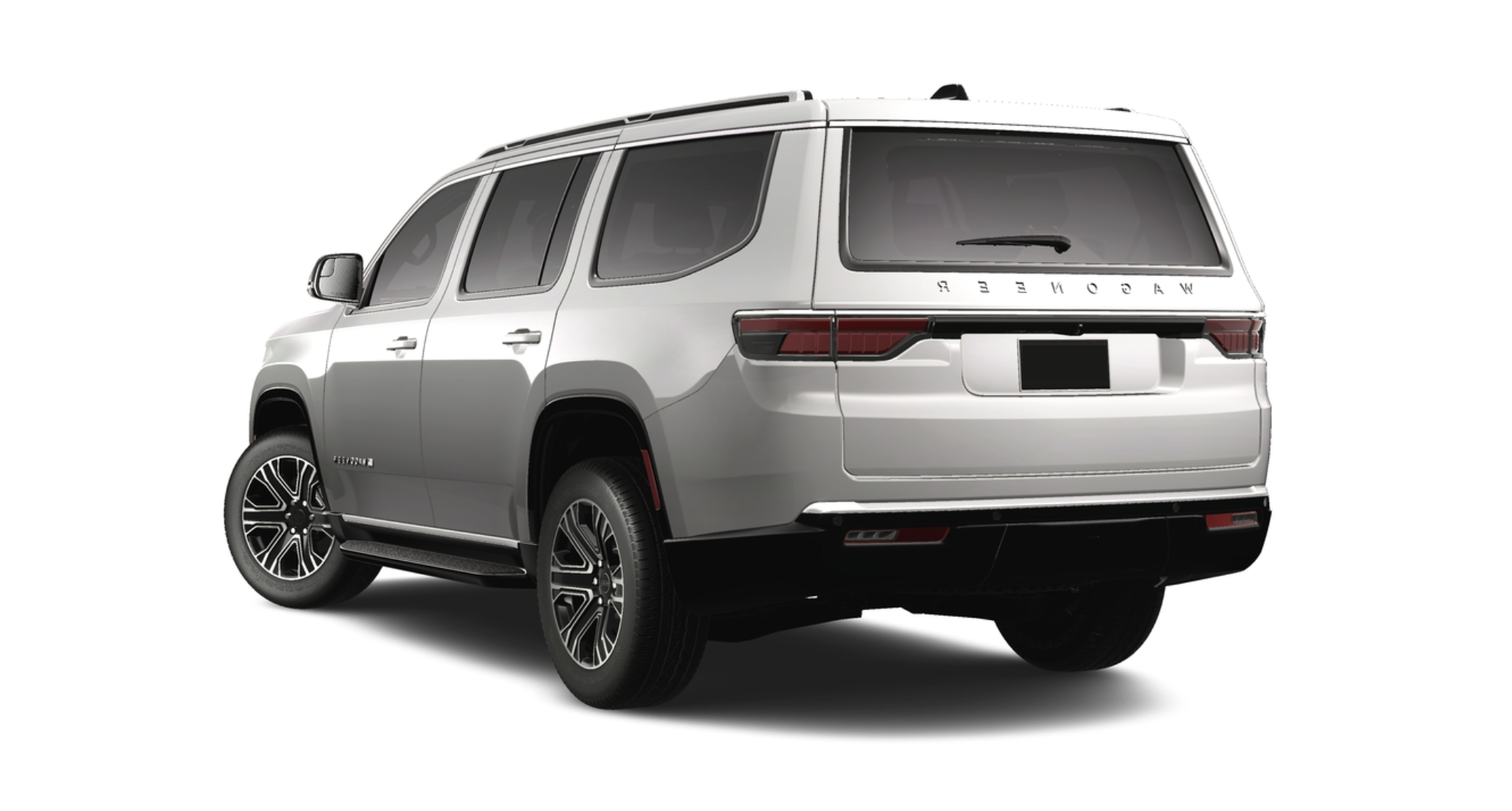 Rear angle of the 2025 Jeep Wagoneer 4WD with LED tail lamps, rear window wiper, and clean tailgate badging