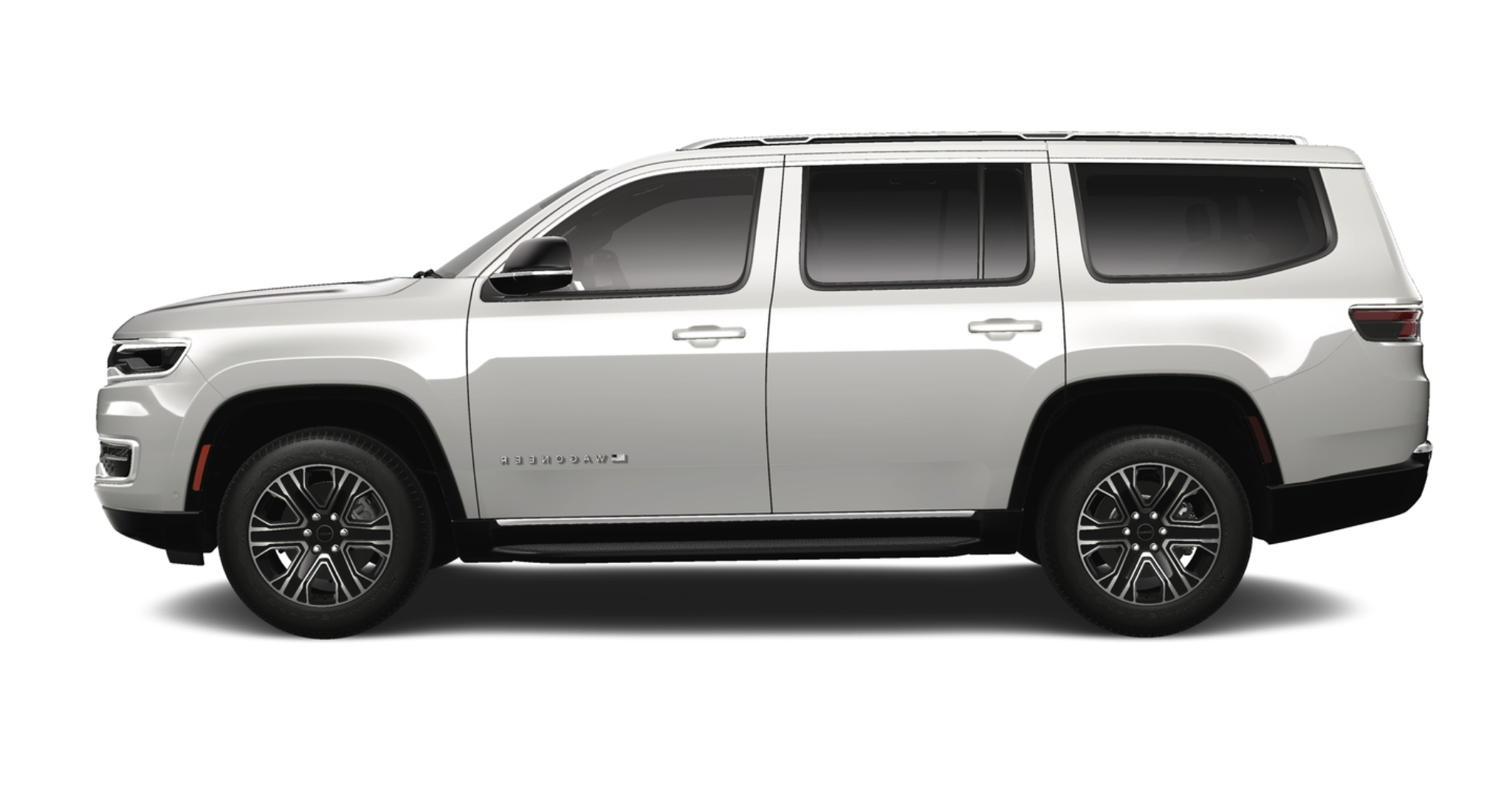 Side profile of the 2025 Jeep Wagoneer 4WD showcasing its extended body, chrome accents, and premium alloy wheels