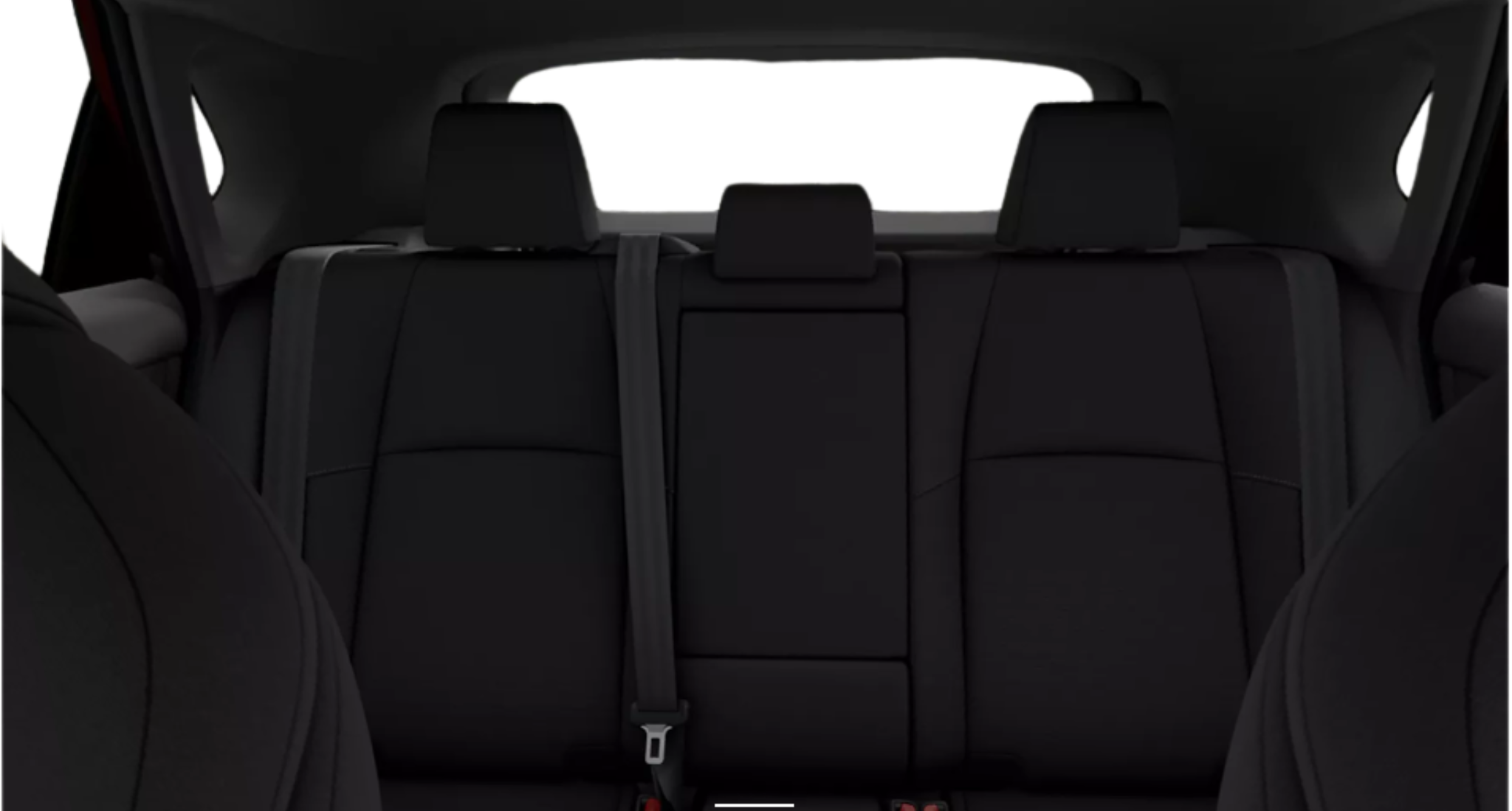 Spacious rear seating of the 2025 Subaru Solterra Premium AWD with modern black cloth upholstery and headrests.