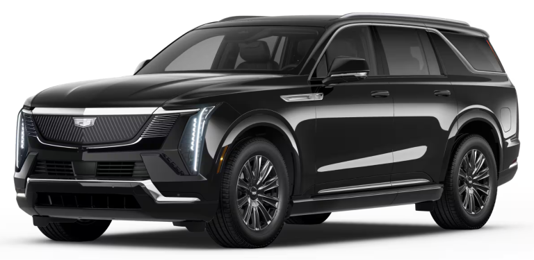 Front exterior of the 2025 Cadillac Escalade IQL electric SUV, highlighting the illuminated grille, signature vertical LED headlights, and bold black finish.