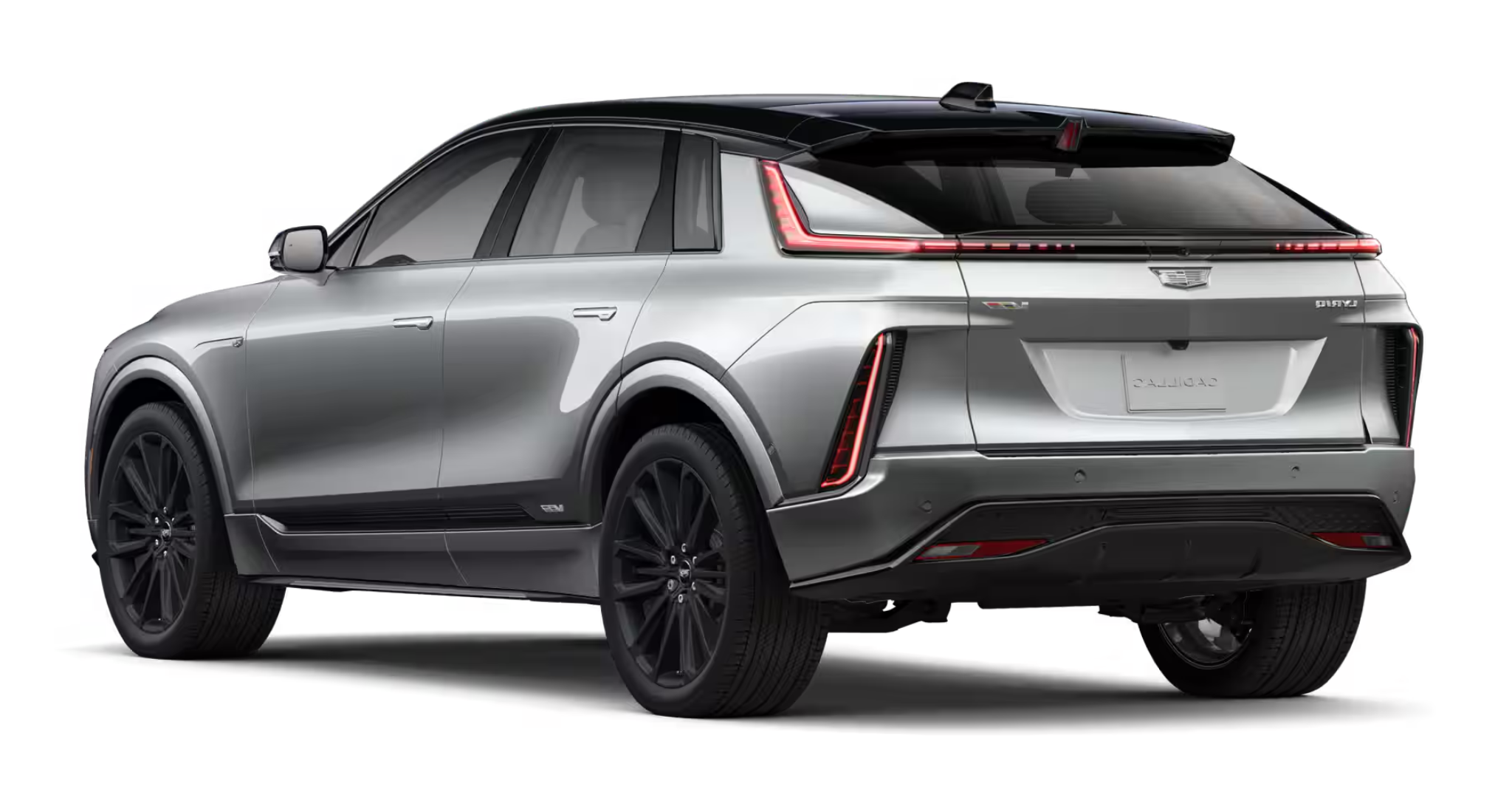 Rear view of the 2025 Cadillac Lyriq-V AWD EV showcasing its bold taillight design, sleek body lines, and sporty black wheels.