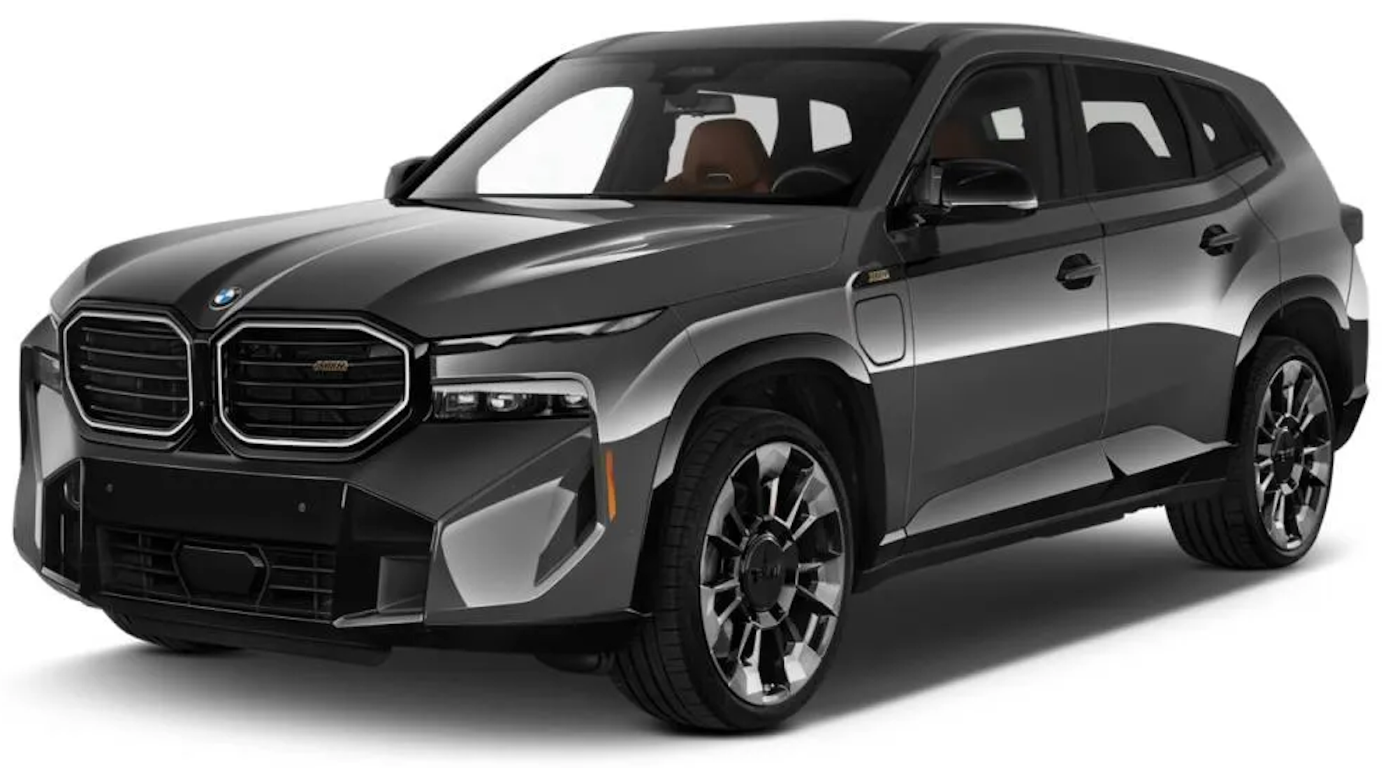 Front angle of the 2025 BMW XM PHEV AWD with illuminated kidney grille, sculpted hood, and aggressive LED lighting.