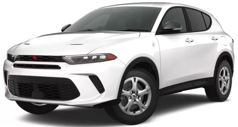 Front view of 2025 Dodge Hornet GT AWD in white with aggressive grille, LED headlights, and signature Dodge styling.