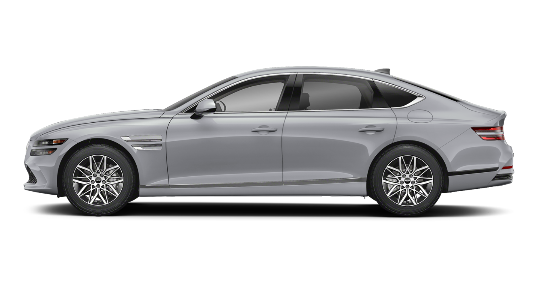 Sleek side view of the 2025 Genesis G80 2.5T AWD with 18-inch alloy wheels and sculpted aerodynamic lines in a silver finish.